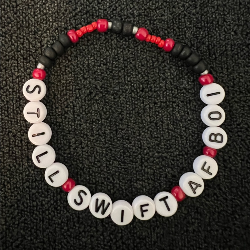 Taylor Swift still swift af boi friendship bracelet